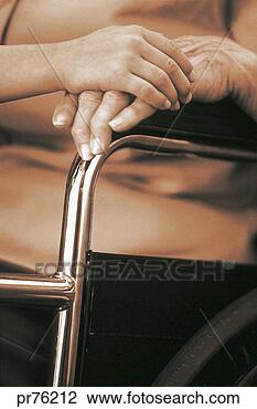 Stock Photo - elderly hand with 
younger hand on 
top. fotosearch 
- search stock 
photos, pictures, 
images, and photo 
clipart