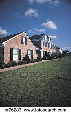 Stock Photo - front lawn and 
exterior of home. 
fotosearch - search 
stock photos, 
pictures, images, 
and photo clipart