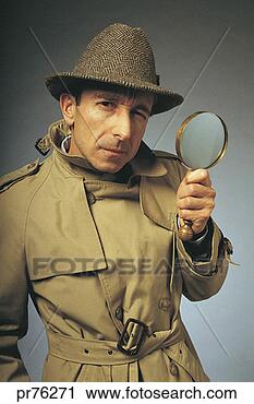Stock Photography - man in trenchcoat 
with magnifying 
glass; character 
portrait. fotosearch 
- search stock 
photos, pictures, 
images, and photo 
clipart