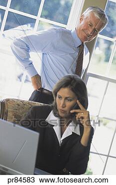 Stock Photo - business team 
working. fotosearch 
- search stock 
photos, pictures, 
images, and photo 
clipart