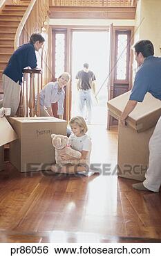 Stock Photo - family moving 
into home. fotosearch 
- search stock 
photos, pictures, 
images, and photo 
clipart