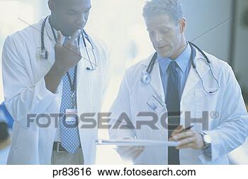 Stock Photo - medical professionals 
in discussion. 
fotosearch - search 
stock photos, 
pictures, images, 
and photo clipart