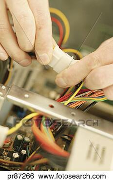 Stock Photo - man holding computer 
part. fotosearch 
- search stock 
photos, pictures, 
images, and photo 
clipart