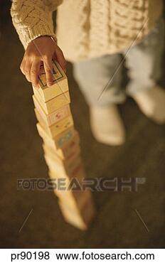 Stock Photo - girl playing with 
blocks. fotosearch 
- search stock 
photos, pictures, 
images, and photo 
clipart