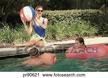 Stock Photography - mother watching 
children play 
in pool. fotosearch 
- search stock 
photos, pictures, 
images, and photo 
clipart