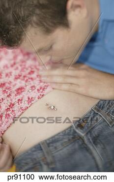 Stock Photography - romantic couple, 
close up of woman's 
stomach. fotosearch 
- search stock 
photos, pictures, 
images, and photo 
clipart