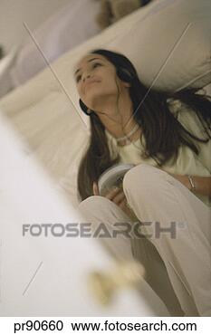 Stock Photography - teenager listening 
to music. fotosearch 
- search stock 
photos, pictures, 
images, and photo 
clipart