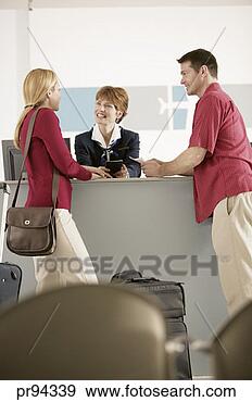 Stock Photograph - couple at airport. 
fotosearch - search 
stock photos, 
pictures, images, 
and photo clipart
