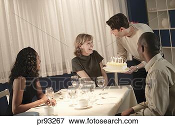 Picture - friends celebrating 
woman's birthday. 
fotosearch - search 
stock photos, 
pictures, images, 
and photo clipart