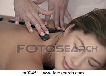 Stock Photography - woman receiving 
massage. fotosearch 
- search stock 
photos, pictures, 
images, and photo 
clipart