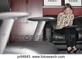 Stock Photo - businesswoman 
with tablet pc. 
fotosearch - search 
stock photos, 
pictures, images, 
and photo clipart