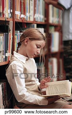 Stock Photography - girl reading in 
library. fotosearch 
- search stock 
photos, pictures, 
images, and photo 
clipart