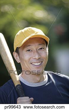 Stock Photo - man portrait with 
baseball hat. 
fotosearch - search 
stock photos, 
pictures, images, 
and photo clipart