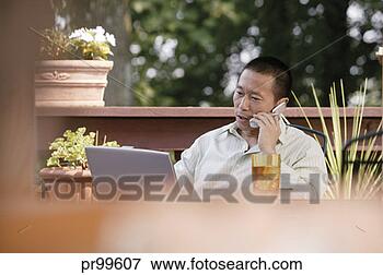 Picture - man working from 
home. fotosearch 
- search stock 
photos, pictures, 
images, and photo 
clipart