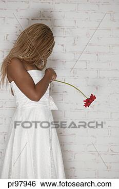 Mulher, segurando, flor
Ampliar Foto Banco de Imagem - mulher, segurando,
flor. fotosearch
- busca de fotos,
imagens e clipart