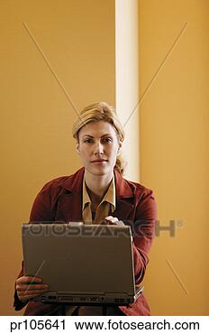 Stock Photography - woman with laptop 
computer, portrait. 
fotosearch - search 
stock photos, 
pictures, images, 
and photo clipart