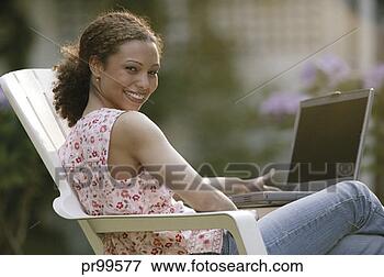 Picture - woman portrait 
with laptop. fotosearch 
- search stock 
photos, pictures, 
images, and photo 
clipart