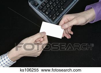 Stock Image - business people 
exchanging a business 
card. fotosearch 
- search stock 
photos, pictures, 
images, and photo 
clipart