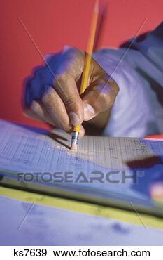 Stock Photograph - businessman erasing 
something from 
account book. 
fotosearch - search 
stock photos, 
pictures, images, 
and photo clipart