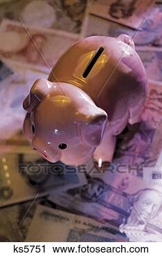 Stock Photography - ceramic piggy 
bank and collage 
of international 
currency. fotosearch 
- search stock 
photos, pictures, 
images, and photo 
clipart