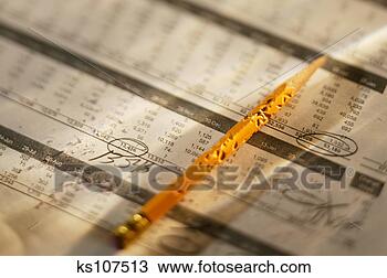 Stock Photo - chewed pencil 
on accounting 
figures. fotosearch 
- search stock 
photos, pictures, 
images, and photo 
clipart