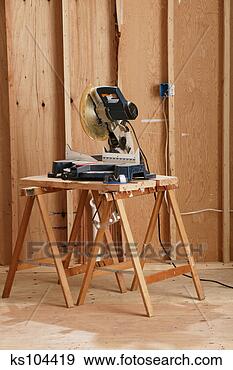 Stock Photograph - circular saw on 
sawhorses. fotosearch 
- search stock 
photos, pictures, 
images, and photo 
clipart