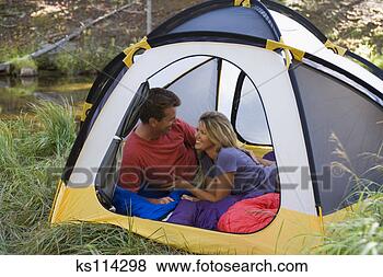 Stock Photo - couple in tent. 
fotosearch - search 
stock photos, 
pictures, images, 
and photo clipart