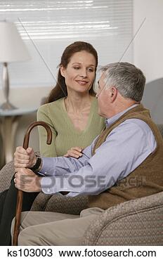 Stock Photo - elderly man sitting 
down with woman. 
fotosearch - search 
stock photos, 
pictures, images, 
and photo clipart