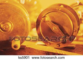 Stock Photography - fishing reel. 
fotosearch - search 
stock photos, 
pictures, images, 
and photo clipart