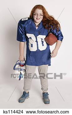 Stock Photo - girl dressed as 
a football player, 
portrait. fotosearch 
- search stock 
photos, pictures, 
images, and photo 
clipart