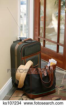 Stock Photo - luggage by door. 
fotosearch - search 
stock photos, 
pictures, images, 
and photo clipart