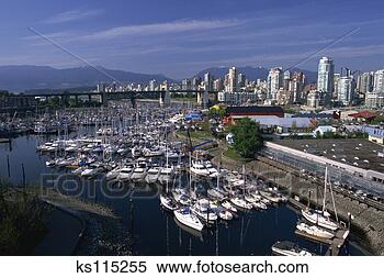 Stock Image - marina at granville 
island with burrard 
street bridge 
and skyline in. 
fotosearch - search 
stock photos, 
pictures, images, 
and photo clipart
