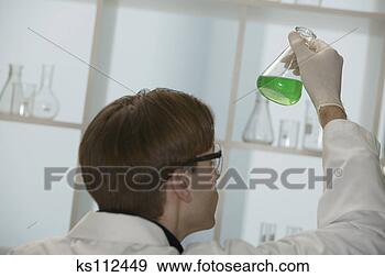 Stock Photograph - scientist working 
in laboratory. 
fotosearch - search 
stock photos, 
pictures, images, 
and photo clipart
