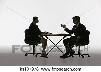Stock Photo - silhouette of 
business meeting. 
fotosearch - search 
stock photos, 
pictures, images, 
and photo clipart