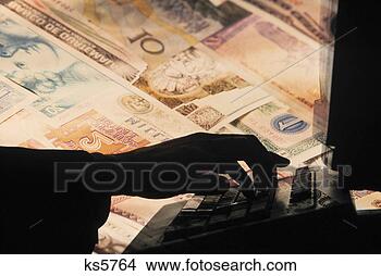 Stock Photo - silhouette of 
hand typing on 
a computer keyboard, 
 against a backdrop. 
fotosearch - search 
stock photos, 
pictures, images, 
and photo clipart