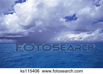 Stock Photo - storm front (cumulus 
raining clouds) 
on ocean bahamas. 
fotosearch - search 
stock photos, 
pictures, images, 
and photo clipart