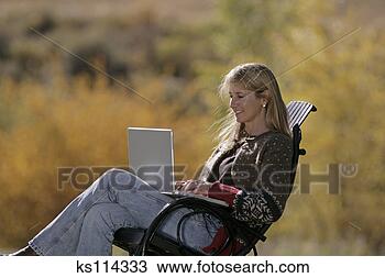 Stock Photo - woman using laptop. 
fotosearch - search 
stock photos, 
pictures, images, 
and photo clipart