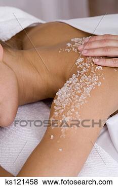 Stock Photo - woman having body 
scrub rubbed on 
her back. fotosearch 
- search stock 
photos, pictures, 
images, and photo 
clipart