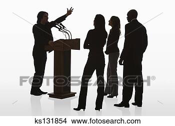 Stock Photo - man speaking to 
audience from 
podium. fotosearch 
- search stock 
photos, pictures, 
images, and photo 
clipart