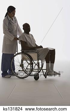 Stock Photo - medical professional 
with patient in 
wheelchair. fotosearch 
- search stock 
photos, pictures, 
images, and photo 
clipart