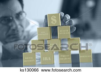 Stock Photo - man stacking blocks 
of money matters. 
fotosearch - search 
stock photos, 
pictures, images, 
and photo clipart