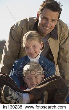 Stock Photo - family smiling 
together. fotosearch 
- search stock 
photos, pictures, 
images, and photo 
clipart