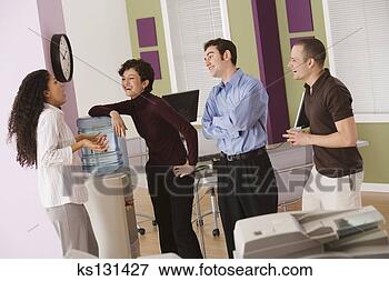 Picture - businesspeople 
chatting by water 
cooler. fotosearch 
- search stock 
photos, pictures, 
images, and photo 
clipart