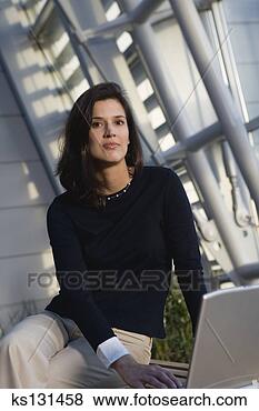 Stock Photo - businesswoman 
with laptop computer. 
fotosearch - search 
stock photos, 
pictures, images, 
and photo clipart