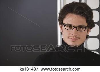 Picture - smiling businessman 
wearing eyeglasses. 
fotosearch - search 
stock photos, 
pictures, images, 
and photo clipart