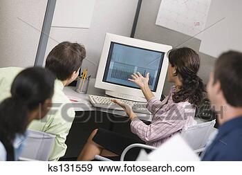 Stock Photograph - business team 
meeting. fotosearch 
- search stock 
photos, pictures, 
images, and photo 
clipart