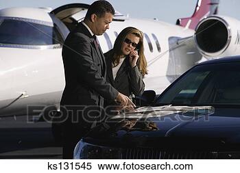 Stock Image - businesspeople 
at airport. fotosearch 
- search stock 
photos, pictures, 
images, and photo 
clipart