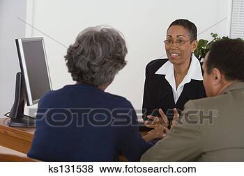 Stock Photo - smiling businesswoman 
at consultation. 
fotosearch - search 
stock photos, 
pictures, images, 
and photo clipart