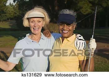 Stock Photograph - friends golfing. 
fotosearch - search 
stock photos, 
pictures, images, 
and photo clipart
