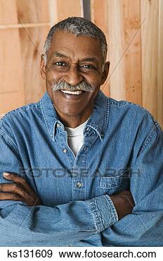 Stock Photograph - smiling man with 
arms crossed. 
fotosearch - search 
stock photos, 
pictures, images, 
and photo clipart